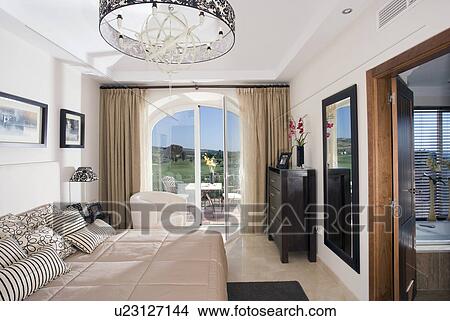 Monochromatic bedroom in Southern Spain View Large Photo Image Picture - Monochromatic bedroom in Southern Spain. Fotosearch