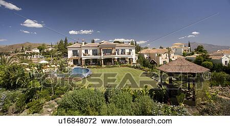 Newly constructed large villa in the hills with pool and garden with lawn. View Large Photo Image Stock Image - Newly constructed large villa in the hills with pool and garden with lawn.. Fotosearch