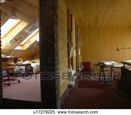 Panelled wall between attic bedroom and study with tongue+groove panelling View Large Photo Image Stock Photography - Panelled wall between attic bedroom and study with tongue+groove panelling. Fotosearch