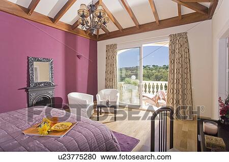Pink bedroom overlooking terrace. View Large Photo Image Stock Image - Pink bedroom overlooking terrace.. Fotosearch