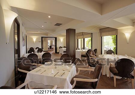 Restaurant decorated in cool monochromatic scheme. View Large Photo Image Stock Photograph - Restaurant decorated in cool monochromatic scheme.. Fotosearch
