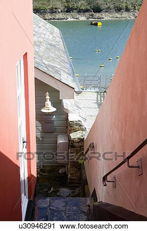 Steps down to cottage by the sea View Large Photo Image Stock Image - Steps down to cottage by the sea. Fotosearch