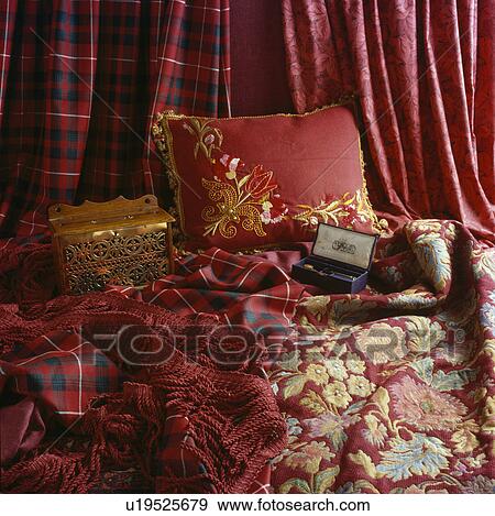 Still-Life of red tartan and patterned furnishing fabric View Large Photo Image Stock Photo - Still-Life of red tartan and patterned furnishing fabric. Fotosearch