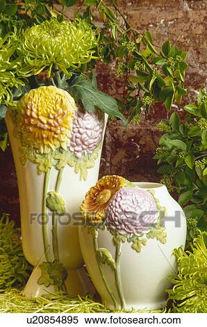 Stock Photography - Still-life of vases with chrysanthemum reliefs. Fotosearch