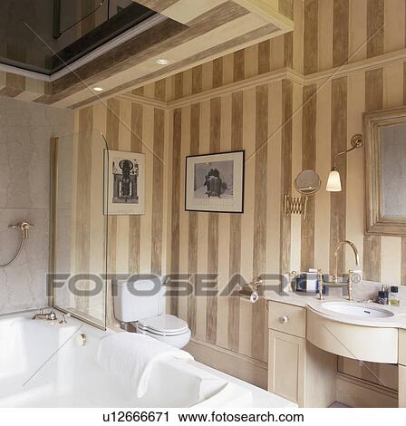 Striped Wallpaper In Neutral Bathroom Stock Image