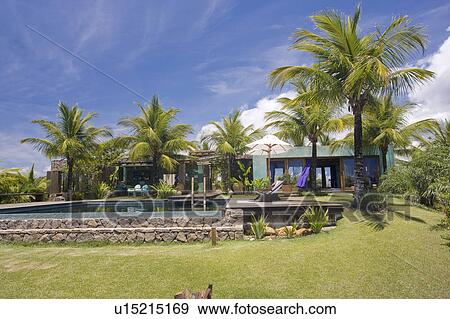 Stock Photo - Swimmingpool at beach house in Brazil.. Fotosearch