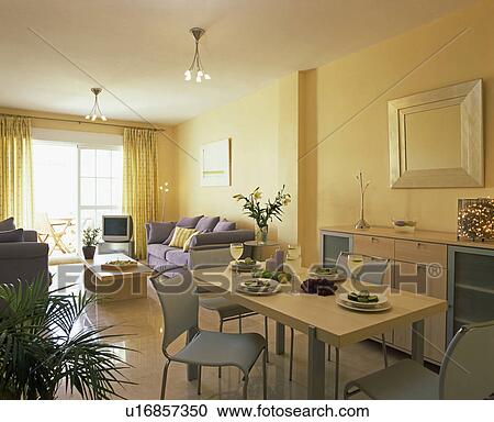 Table and chairs in modern studio apartment View Large Photo Image Stock Image - Table and chairs in modern studio apartment. Fotosearch