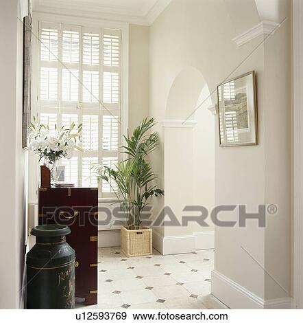 Tall window in modern white hall View Large Photo Image Stock Photo - Tall window in modern white hall. Fotosearch