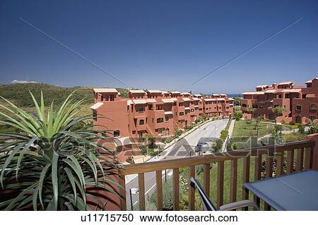 Terracotta coloured new villas for sale in Spain. View Large Photo Image Stock Image - Terracotta coloured new villas for sale in Spain.. Fotosearch