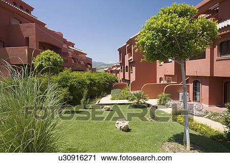 Terracotta coloured new villas for sale in Spain. View Large Photo Image Stock Image - Terracotta coloured new villas for sale in Spain.. Fotosearch