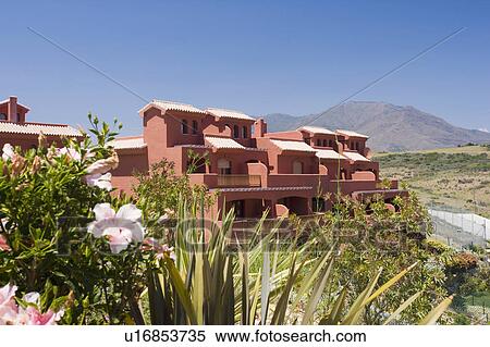 Terracotta coloured new villas for sale in Spain. View Large Photo Image Stock Photography - Terracotta coloured new villas for sale in Spain.. Fotosearch
