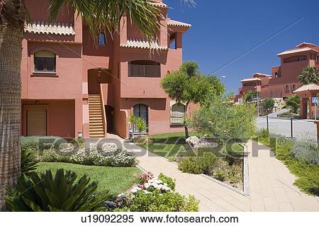 Terracotta coloured new villas for sale in Spain. View Large Photo Image Stock Photography - Terracotta coloured new villas for sale in Spain.. Fotosearch