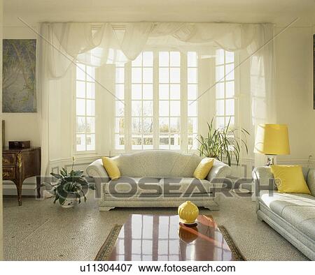 Terrazzo floor and blue sofas in traditional French living room View Large Photo Image Stock Photo - Terrazzo floor and blue sofas in traditional French living room. Fotosearch