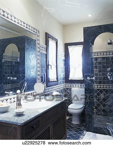 Traditional blue tiled Spanish bathroom View Large Photo Image Stock Photo - Traditional blue tiled Spanish bathroom. Fotosearch