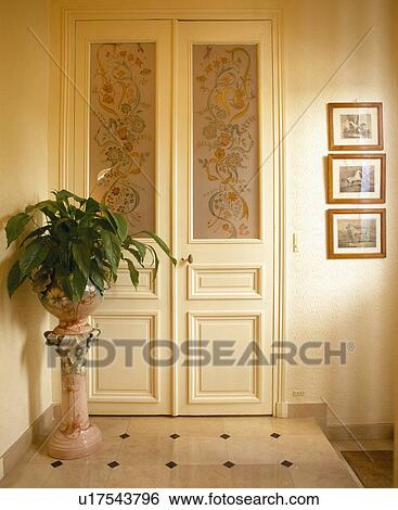 Stock Photograph - Traditional cream hall. . Fotosearch