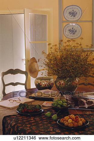 Stock Photograph - Traditional French country dining room. Fotosearch