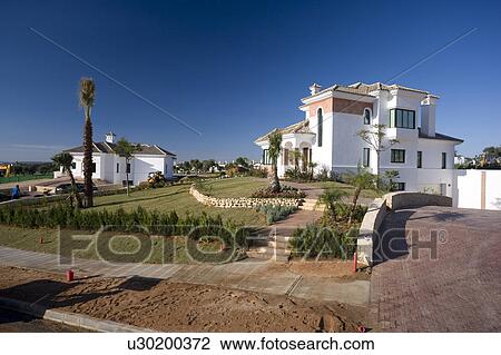 Unfinished villas at Arcos de la frontera Golf course Southern Spain View Large Photo Image Stock Image - Unfinished villas at Arcos de la frontera Golf course Southern Spain. Fotosearch