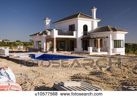 Stock Photo - Unfinished villas at Arcos de la frontera Golf course Southern Spain. Fotosearch