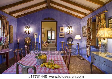 Unusually styled diningroom with pitched roof and ornate furniture. View Large Photo Image Stock Image - Unusually styled diningroom with pitched roof and ornate furniture.. Fotosearch