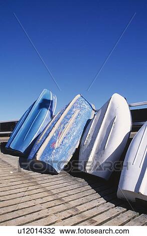 Upturned boats on wooden slipway at Broadstairs in Kent View Large Photo Image Stock Image - Upturned boats on wooden slipway at Broadstairs in Kent. Fotosearch