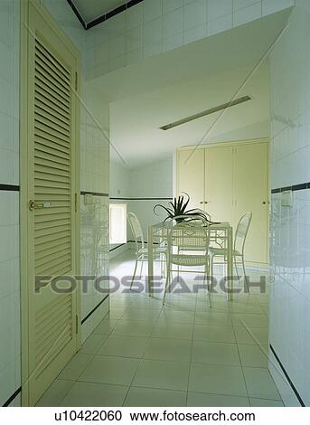White ceramic tiled floor in modern white dining room View Large Photo Image Stock Image - White ceramic tiled floor in modern white dining room. Fotosearch