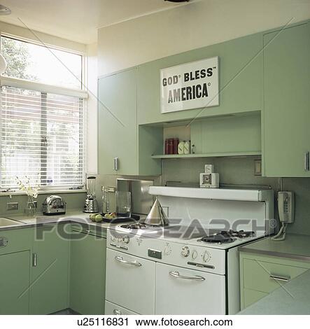 White range oven in pastel green modern kitchen View Large Photo Image Stock Image - White range oven in pastel green modern kitchen. Fotosearch