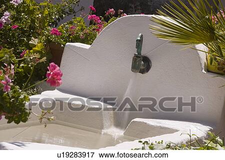 White stucco building Arcos de la frontera in Southern Spain View Large Photo Image Stock Photo - White stucco building Arcos de la frontera in Southern Spain. Fotosearch