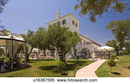White stucco building Arcos de la frontera in Southern Spain View Large Photo Image Stock Photography - White stucco building Arcos de la frontera in Southern Spain. Fotosearch