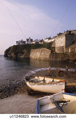 Stock Image - Wooden boats on slipway in harbour at Port Isaac in Cornwall. Fotosearch