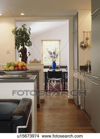 Wooden flooring in small open-plan kitchen and living room View Large Photo Image Picture - Wooden flooring in small open-plan kitchen and living room. Fotosearch