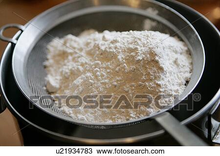 Baking ingredients in sieve /step shot View Large Photo Image Stock Image - Baking ingredients in sieve /step shot. Fotosearch