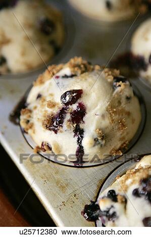 Stock Image - Blueberry Muffins Ready from the Oven. Fotosearch