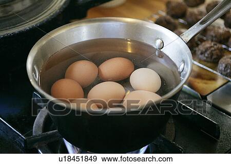 Boiling Eggs in saucepan View Large Photo Image Stock Photo - Boiling Eggs in saucepan. Fotosearch