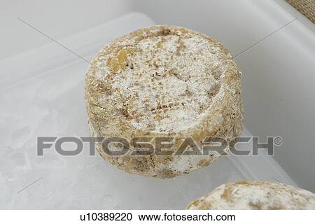 Stock Image - Cheese at Farmers Market. Fotosearch