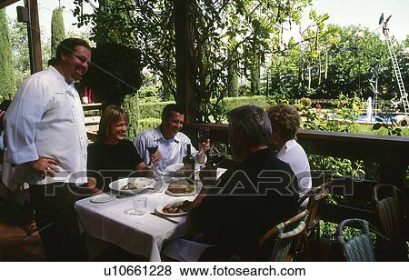 Stock Photo - Chef at table. Fotosearch