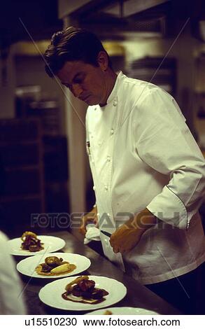Chef in kitchen View Large Photo Image Stock Image - Chef in kitchen. Fotosearch