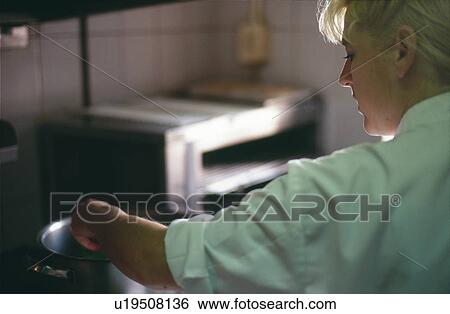 Stock Photograph - Chef in kitchen. Fotosearch