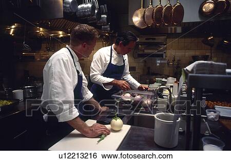 Stock Photograph - Chefs in kitchen. Fotosearch