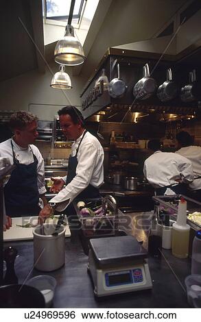 Stock Photograph - Chefs in kitchen. Fotosearch