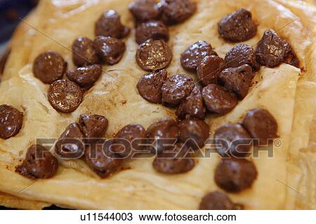 Chocolate Chips in Pastry View Large Photo Image Stock Image - Chocolate Chips in Pastry. Fotosearch
