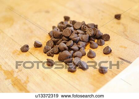 Chocolate chips View Large Photo Image Stock Photo - Chocolate chips. Fotosearch