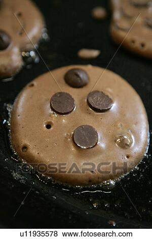 Stock Photo - Chocolate Pancakes /step shot. Fotosearch