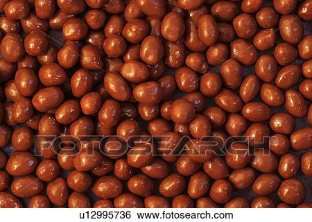 Stock Photograph - Chocolate Peanuts. Fotosearch