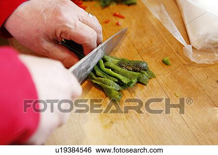 Chopping Green Peppers View Large Photo Image Stock Photograph - Chopping Green Peppers. Fotosearch