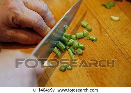 Chopping Scallions View Large Photo Image Stock Photo - Chopping Scallions. Fotosearch