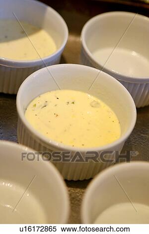 Stock Photography - Corn Custard in Ramekins. Fotosearch