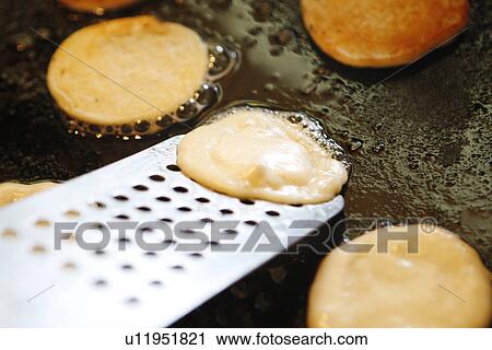 Stock Image - Cornmeal Pancakes/ step shot. Fotosearch