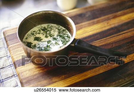 Stock Photography - Cream sauce with herbs. Fotosearch