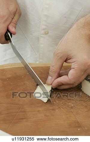 Stock Photography - Cutting Cheese at Farmers Market. Fotosearch