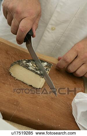 Stock Photography - Cutting Cheese at Farmers Market. Fotosearch